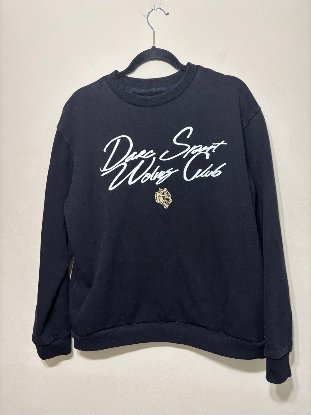 Darc Sport Black Crewneck with White Script and Gold Wolf Emblem